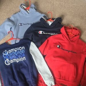 4- Champion Hoodies Set in Red, Blue, and Gray